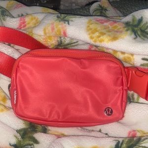pale raspberry Lululemon belt bag